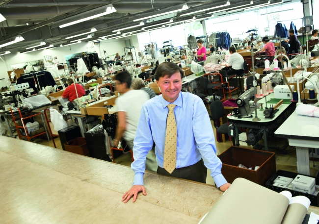 For Guardian Creative. FedEx Supplement. Pictured is Christopher Nieper of David Nieper LTD of Alfreton, where they produce ladies clothing. Photo by Fabio De Paola